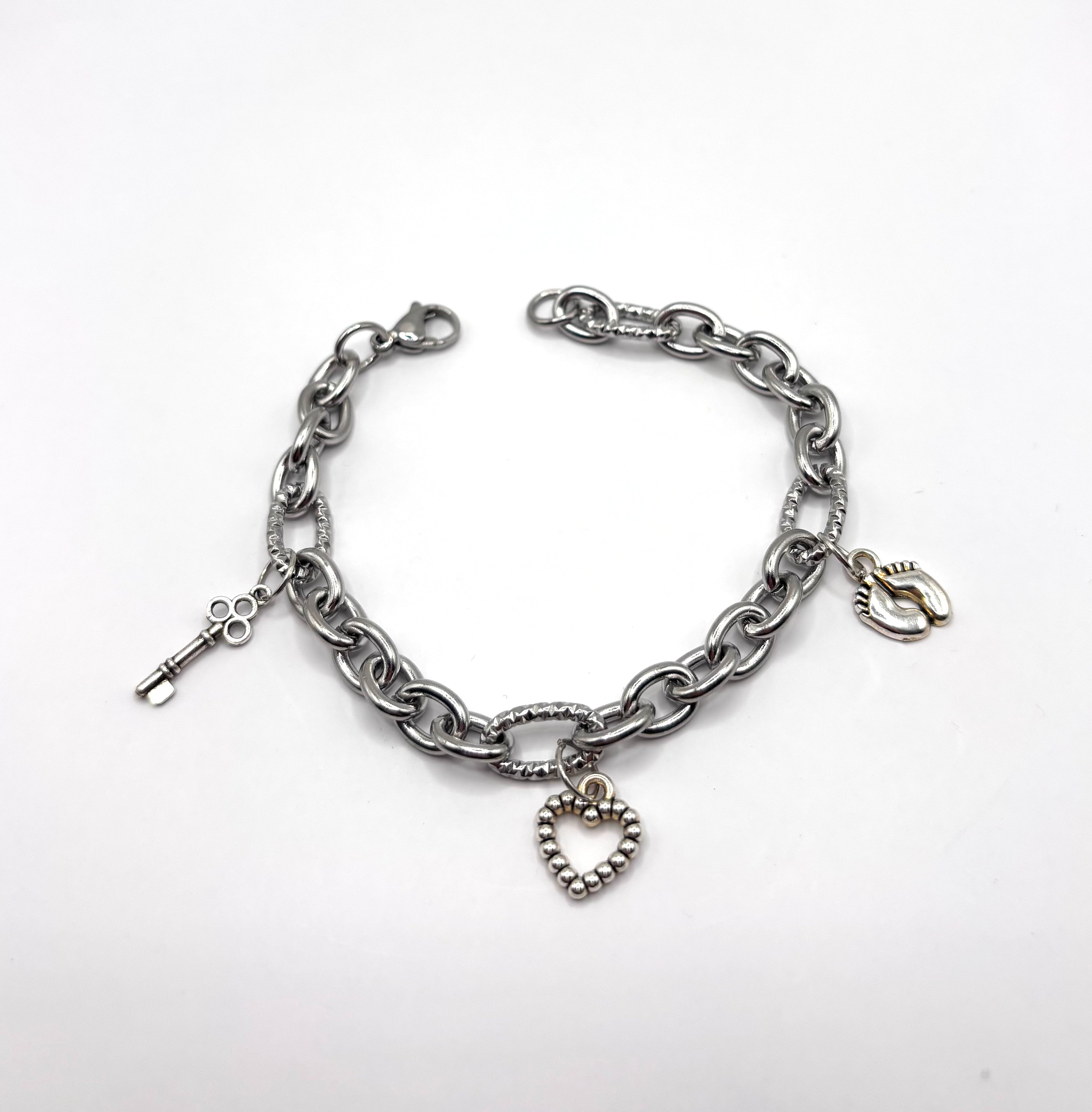 Schakelarmband met bedeltjes hart voetjes sleutel zilverkleurig-RK Sieraden