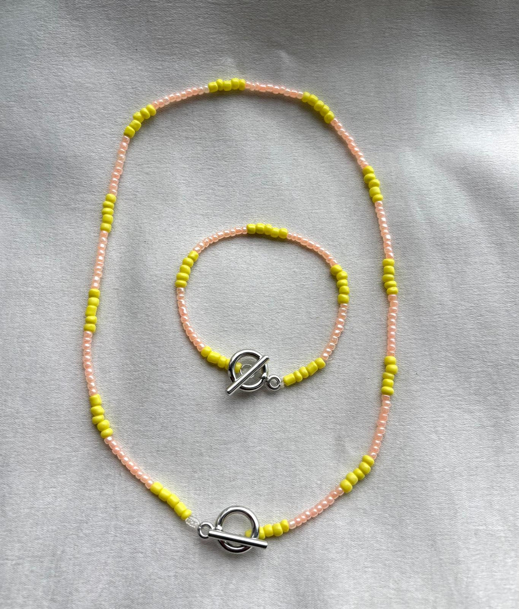 Luxe Ketting Armband Set Geel Zalm met Diamantjes - Elegante Sieraden