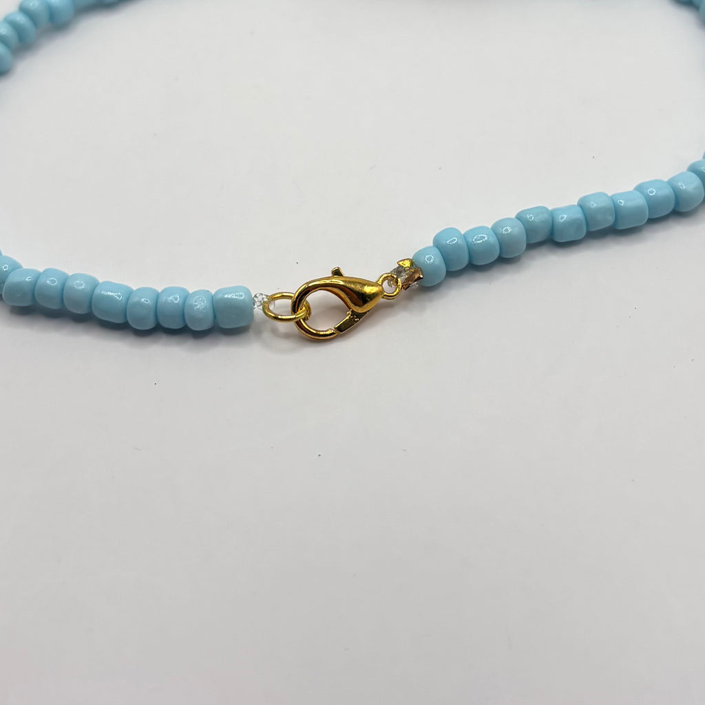 licht blauwe kralen ketting sluiting