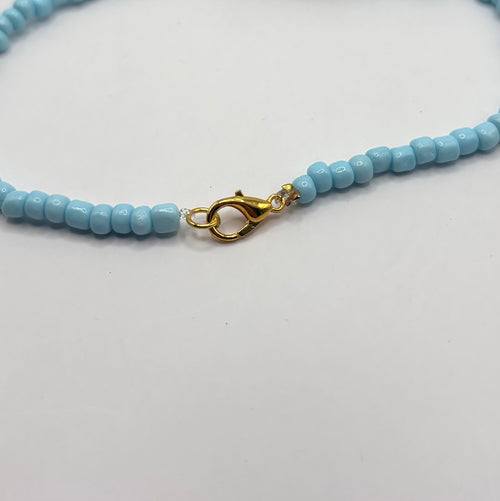 Licht blauw ketting met bedeltje
