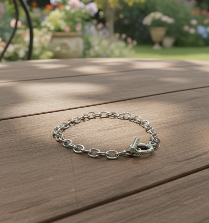 Zilverkleurige armband met ronde oog sluiting