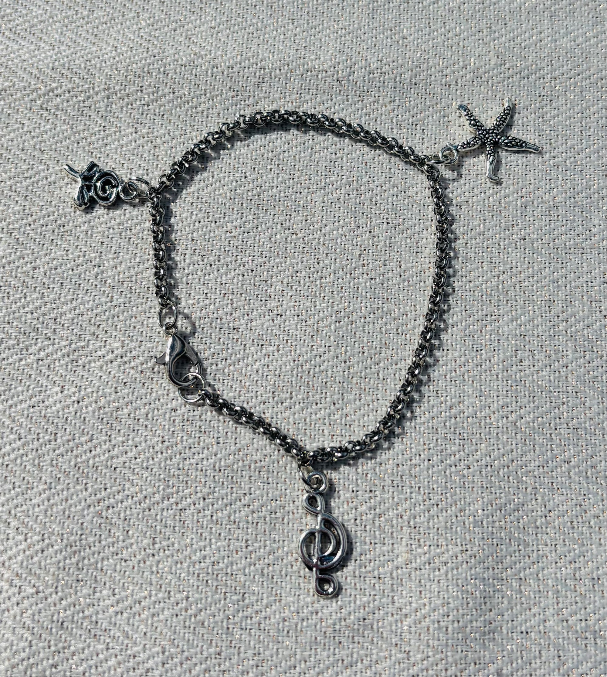 Armband met Zeester Bloem Muzieknoot Bedeltjes 18cm zilverkleurig - Thema Charms