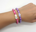 Smile Armbanden 2 stuks met vrolijke kleuren roze, paars