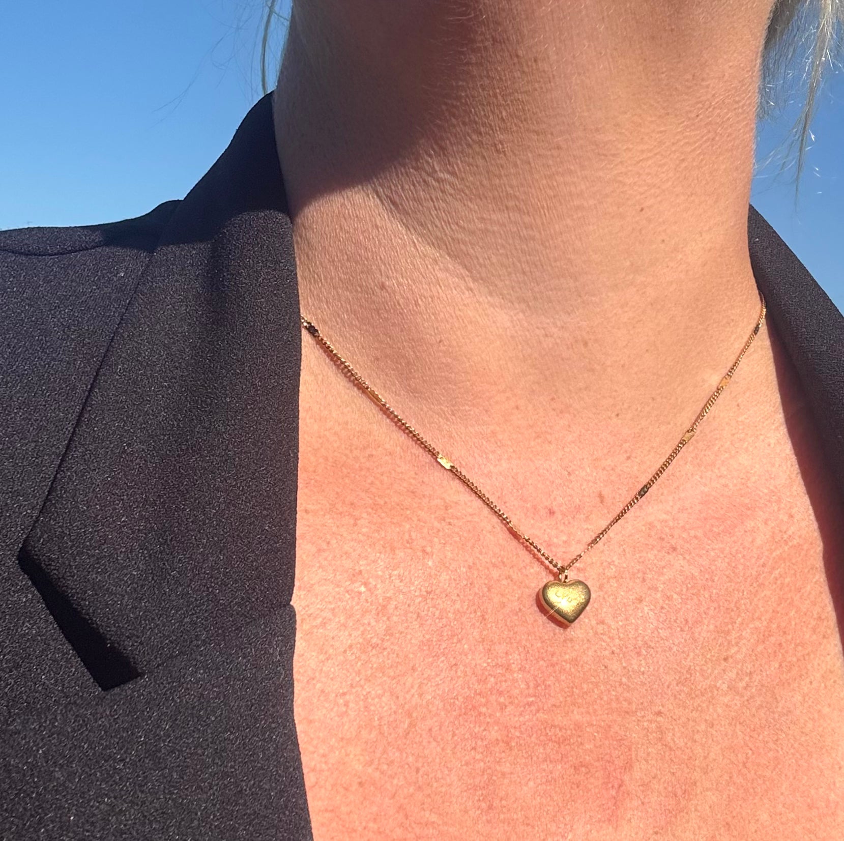 Hart ketting met hartvormige hanger met de tekst "love"