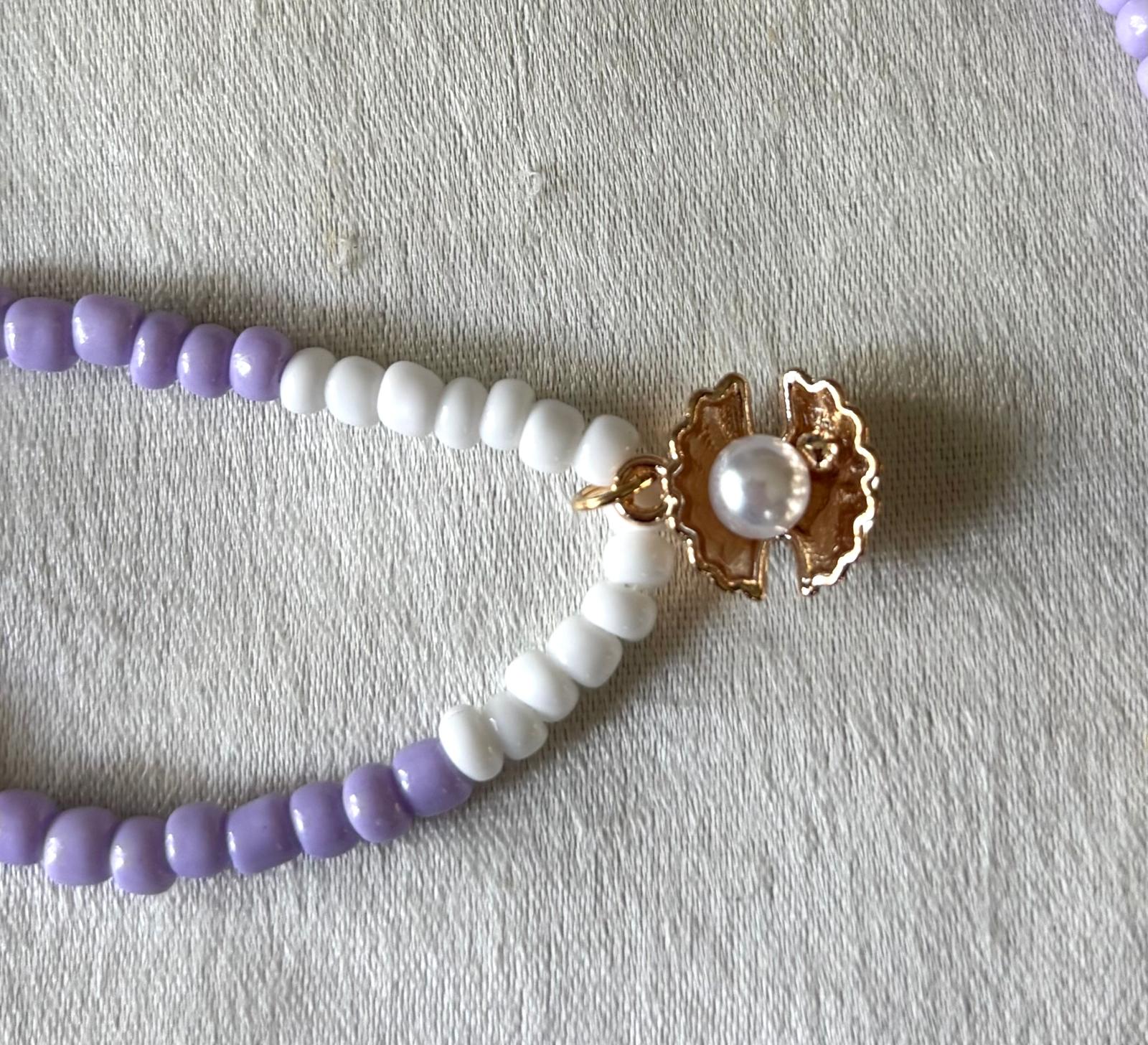 handgemaakte kralen ketting kleur paars met hanger parel schelp