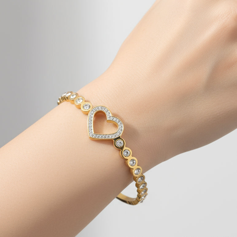 slager armband met hart goudkleur