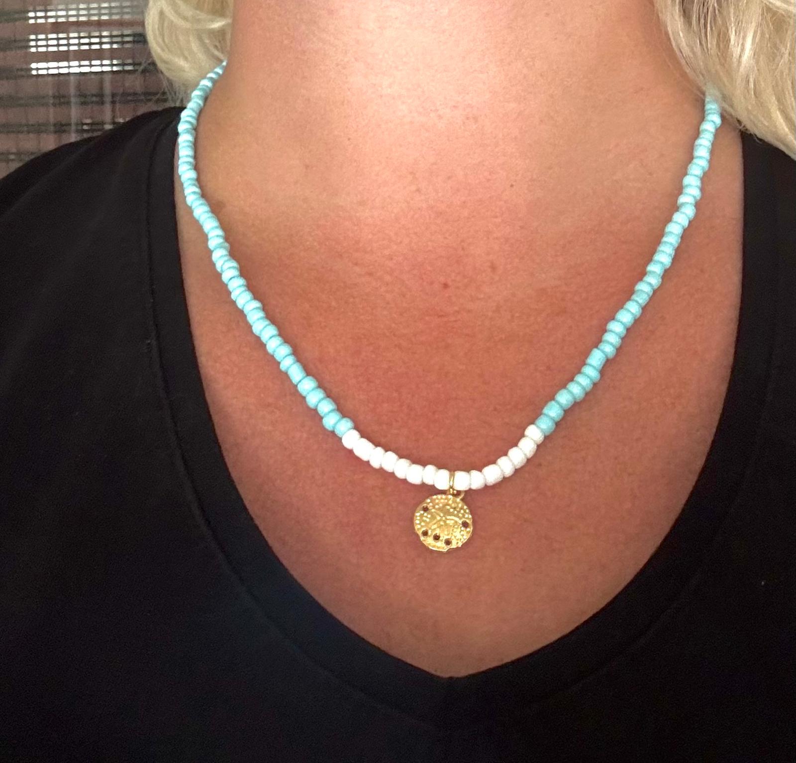 Licht blauw ketting met bedeltje