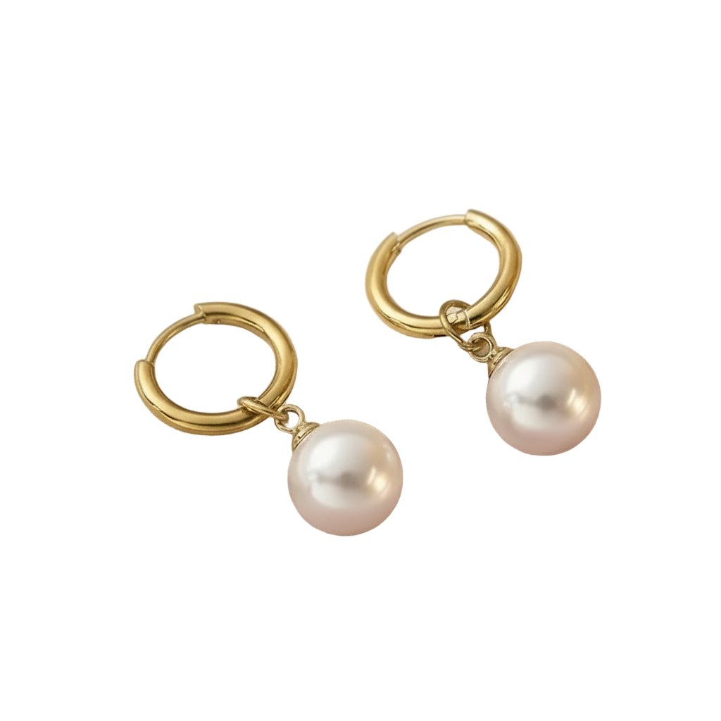 Goudkleurige oorbellen met parel hanger 