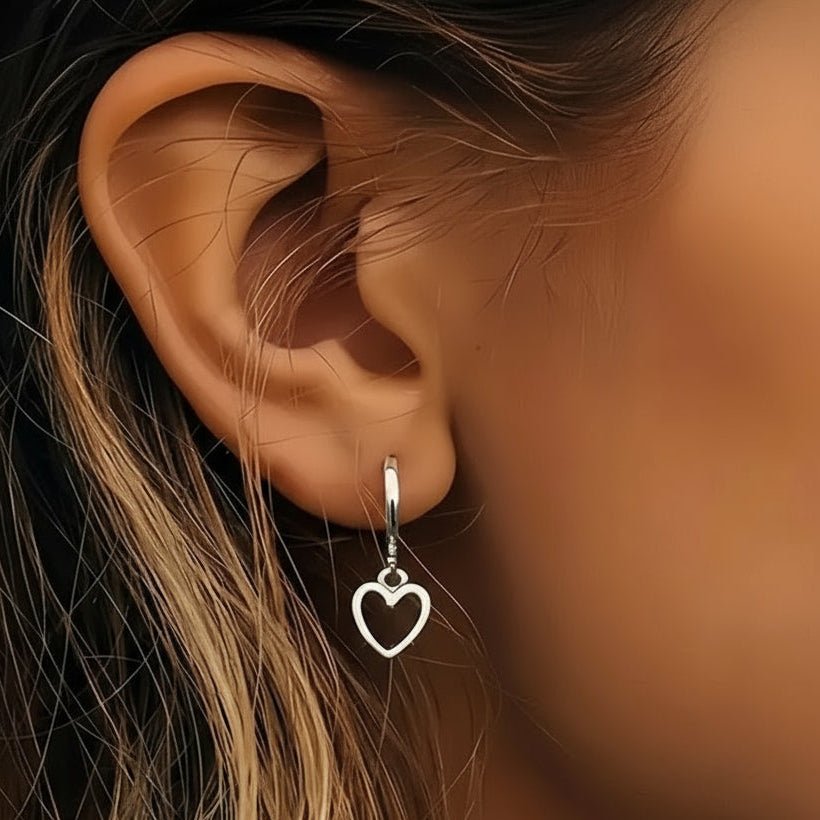 zilverkleurige rvs kleine oorringen met hartjes hanger 