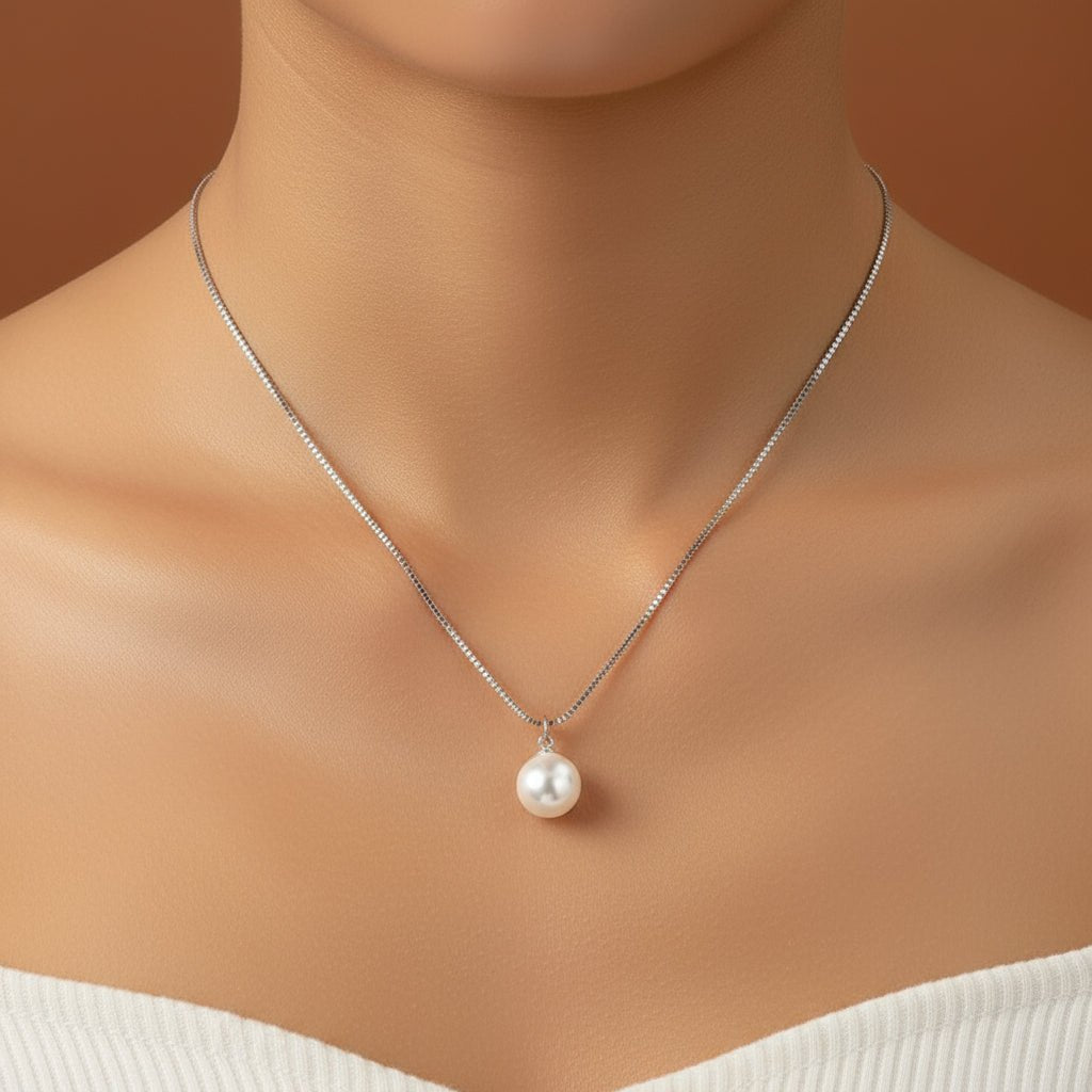 zilverkleurige ketting met parel hanger 