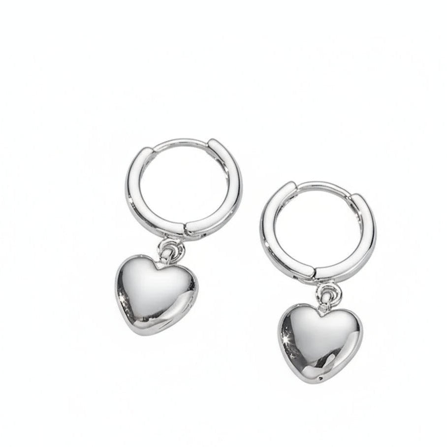 zilverkleurig kleine oorringen met hartjes hanger 