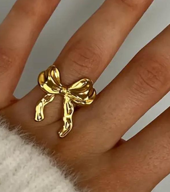 strik ring 
goudkleur