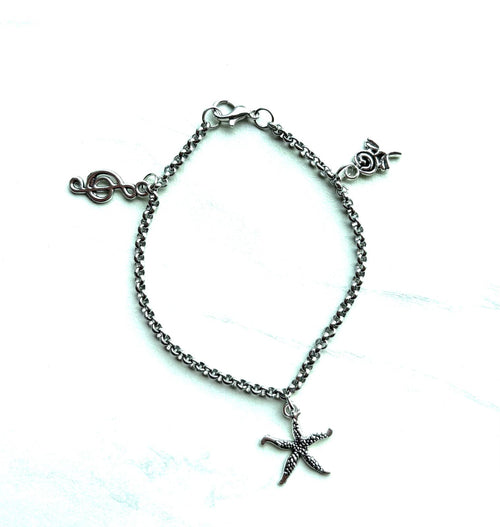 Armband met Zeester Bloem Muzieknoot Bedeltjes 18cm zilverkleurig - Thema Charms